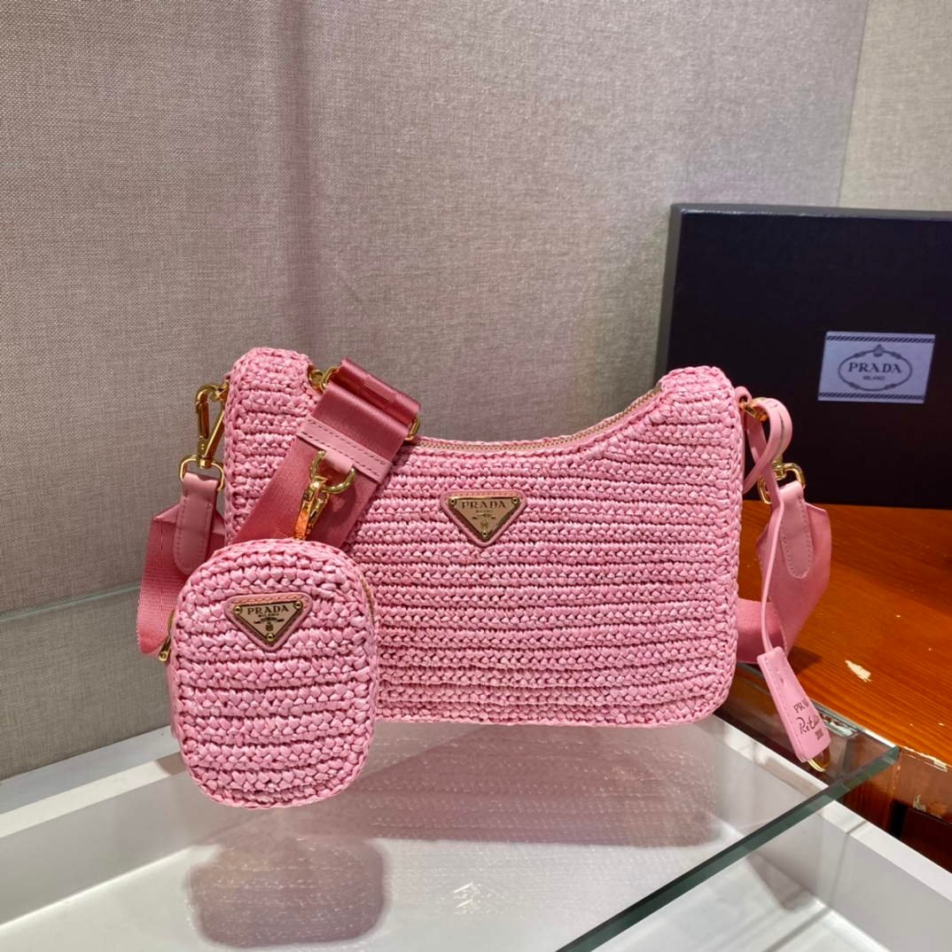 65324ed018c94.jpg Replica Prada 1BH204 Prada Re-Edition 2005 Raffia Bag in Pink38847 - Image 1