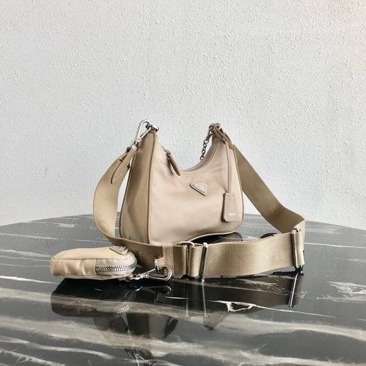 Our Factory offer best Designer HIGH quality replica handbags in cheaper price! Up to 70% discount now. Quality Guarantee! Fast Shipping Worldwide Replica Prada 1BH204 Prada Re-Edition 2005 Nylon Bag Apricot38739 - Image 1