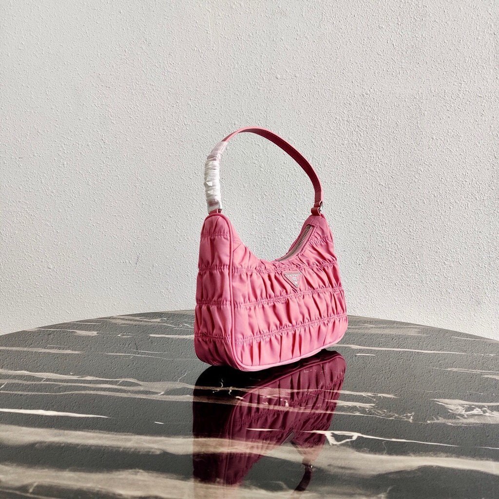 Our Factory offer best Designer HIGH quality replica handbags in cheaper price! Up to 70% discount now. Quality Guarantee! Fast Shipping Worldwide Replica Prada 1NE204 Prada Nylon and Saffiano Leather Mini Bag in Pink39148 - Image 1