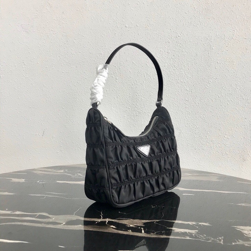 Our Factory offer best Designer HIGH quality replica handbags in cheaper price! Up to 70% discount now. Quality Guarantee! Fast Shipping Worldwide Replica Prada 1NE204 Prada Nylon and Saffiano Leather Mini Bag in Black39108 - Image 1
