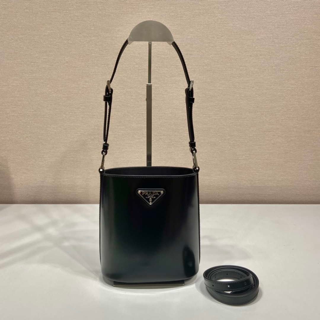 653252241cc6a.jpg Replica Prada Mini brushed-leather bucket bag 1BE059 Black40151 - Image 1