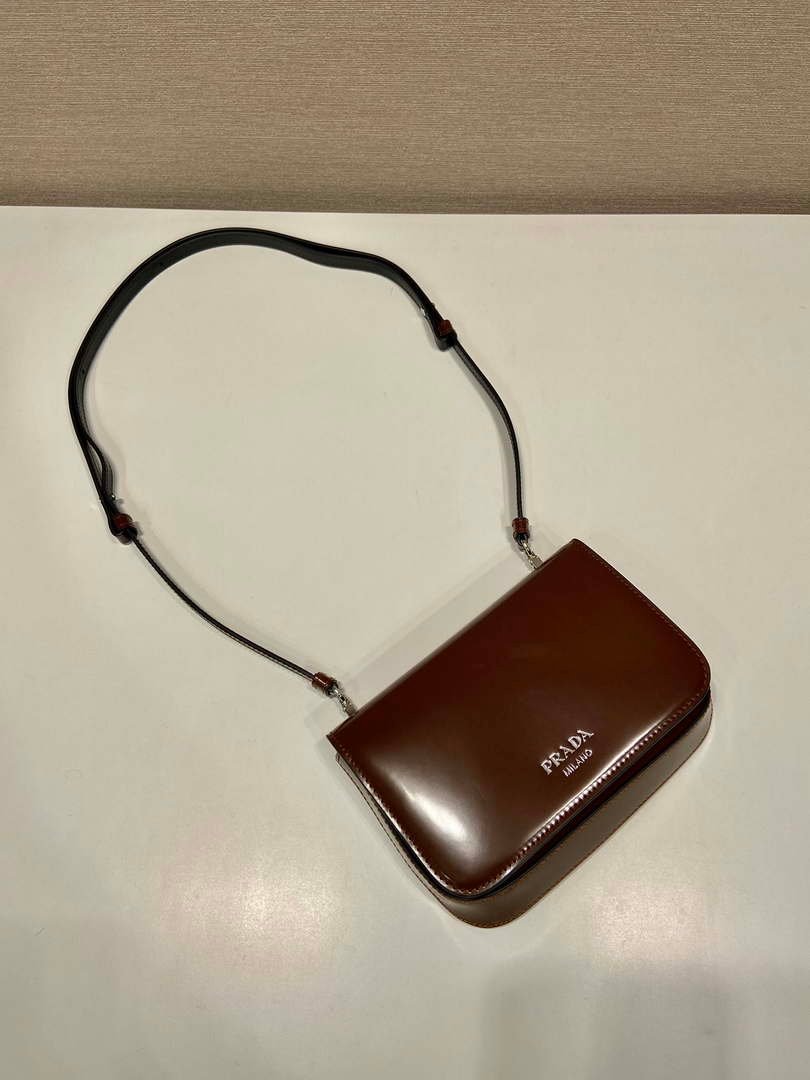 65325aef34163.jpg Replica Prada 2VD061 Black Brushed Leather Mini-bag With Shoulder Strap Brown39744 - Image 1