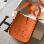Replica Hermes Evelyne Bag Hermes Mini Crossbody Bag 20405 Silver Buckle Orange35087