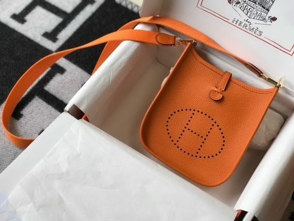 6532775ce8022.jpg Replica Hermes Evelyne Bag Designer Hermes Mini Crossbody Bag 20390 Gold Buckle Orange34337 - Image 1