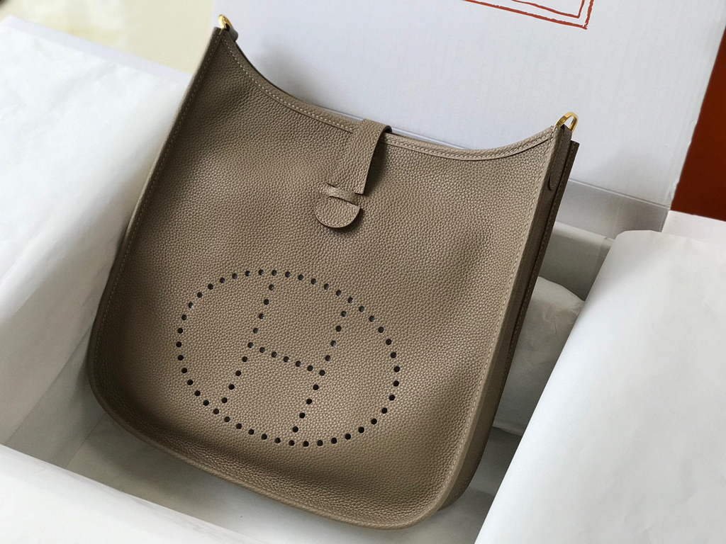 Wholesale replica highest quality luxury handbags, clothing, shoes, jewelry, etc. in cheaper price! Up to 70% discount now. Quality Guarantee! Replica Hermes H083434 Evelyne III 29 bag Designer Hermes Shoulder Bag 203876 - Image 1